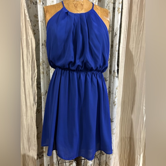 finn & clover Dresses & Skirts - Halter open back knee high Flowy dress